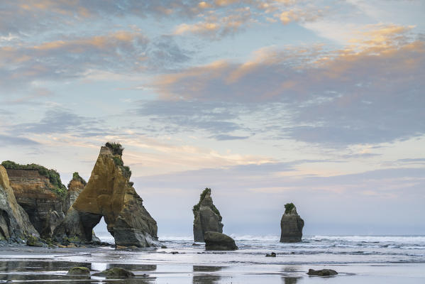Reflections at the Three Sisters beach. Tongaporutu, New Plymouth district. Taranaki region, North Island, New Zealand.