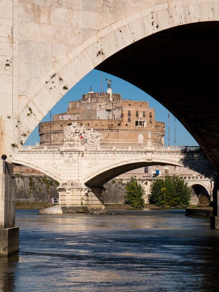 The Castle of the Holy Angel framed in the arch of a bridge
Europe, Italy, Lazio Region, Province of Rome, Rome