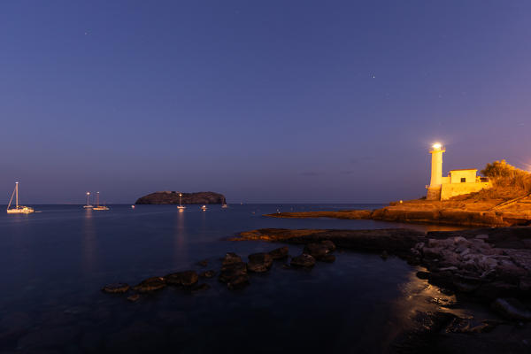 The Roman Port area of Ventotene with the lighthouse. In the background the island of Santo Stefano with its prison.
Europe, Italy, Lazio, Province of Latina, Island of Ventotene
