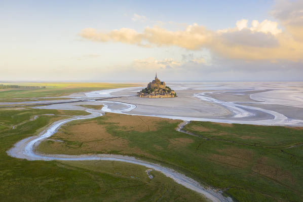Aerial view of Le Mont Saint Michel at dawn. Normandy, Manche, Avranches, Pontorson, France, Western Europe.