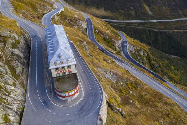 Aerial view of the Belvedere Hotel and the Furka Pass road,  famous for a scene of the James Bond film Goldfinger, a high mountain pass in the Swiss Alps connecting Gletsch, Valais with Realp, Uri. Obergoms, Canton of Valais, Swiss Alps, Switzerland.