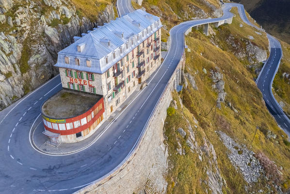 Aerial view of the Belvedere Hotel and the Furka Pass road,  famous for a scene of the James Bond film Goldfinger, a high mountain pass in the Swiss Alps connecting Gletsch, Valais with Realp, Uri. Obergoms, Canton of Valais, Swiss Alps, Switzerland.