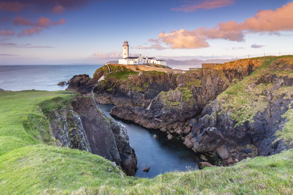 View of the Fanad Head (Fánaid) lighthouse at sunset, County Donegal, Ulster region, Ireland, Europe.