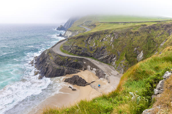 Foggy view of the Coumeenoole beach (Slea Head). Dingle peninsula, County Kerry, Munster province, Ireland, Europe.
