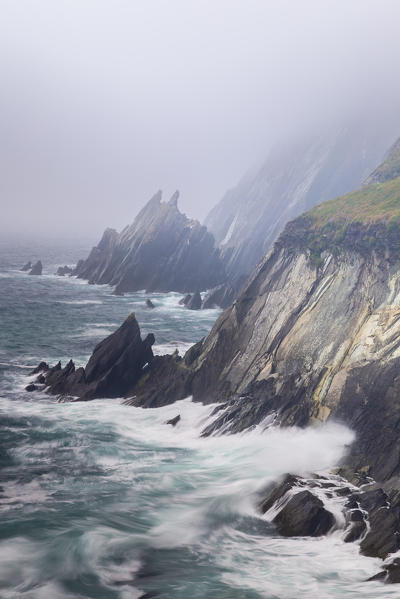 Foggy view of the Coumeenoole beach (Slea Head). Dingle peninsula, County Kerry, Munster province, Ireland, Europe.