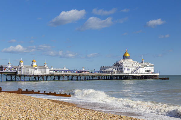 Daylight view of the Eastbourne pier from the shore. Eastbourne, East Sussex, England, United Kingdom.