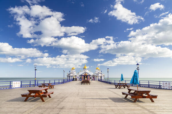 Daylight view of the Eastbourne pier from the shore. Eastbourne, East Sussex, England, United Kingdom.