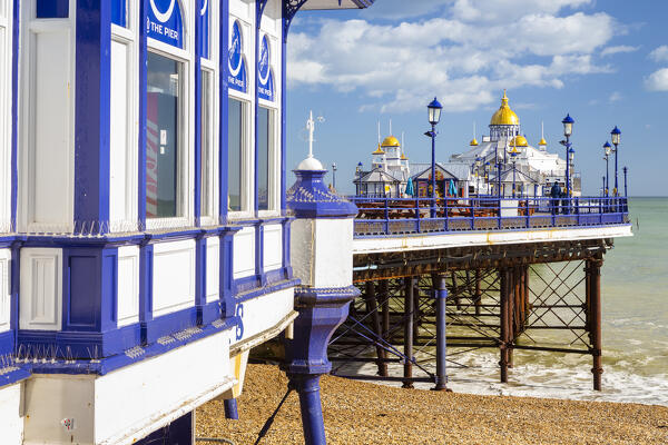 Daylight view of the Eastbourne pier from the shore. Eastbourne, East Sussex, England, United Kingdom.