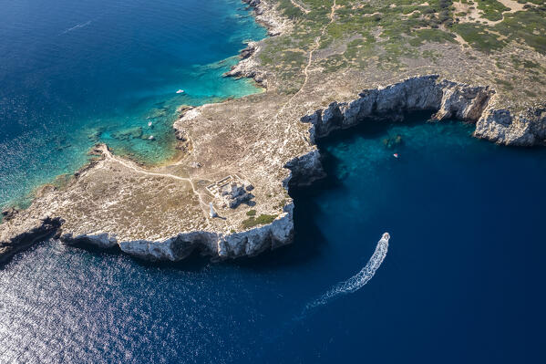 View of Punta del Grottone and it's abandoned lighthouse on Isola di Capraia. Tremiti Islands, Foggia district, Puglia, Italy.