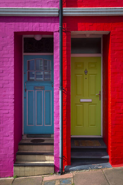 View of the doors of the colorful houses in Blaker street, Brighton, East Sussex, Southern England, United Kingdom.