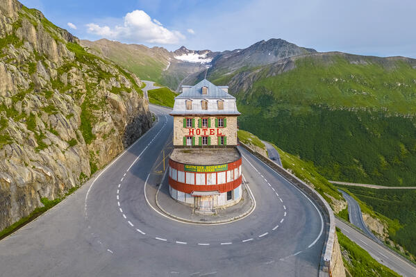 Aerial view of the Belvedere Hotel and the Furka Pass road, famous for a scene of the James Bond film Goldfinger, a high mountain pass in the Swiss Alps connecting Gletsch, Valais with Realp, Uri. Obergoms, Canton of Valais, Swiss Alps, Switzerland.