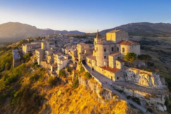 Aerial view of the ancient town of Petralia Soprana, built on a cliff, at sunset. Palermo district, Sicily, Italy.