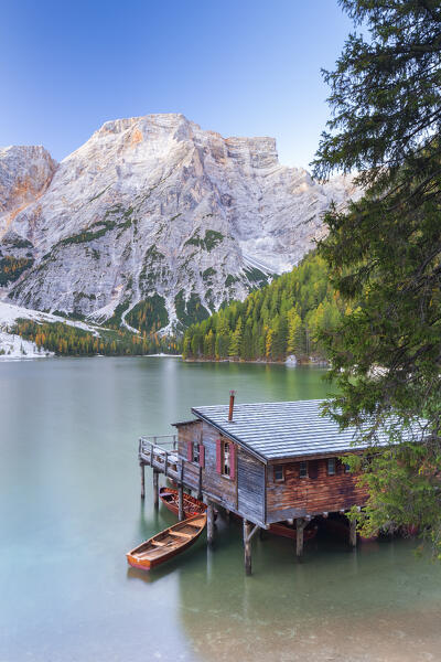 View of Braies lake in autumn season at sunrise. Europe, Italy, South Tyrol, Braies valley, Bolzano province, Braies municipality.