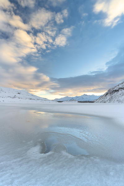 Frozen lake Montespluga, Chiavenna Valley, Sondrio province, Valtellina, Lombardy, Italy