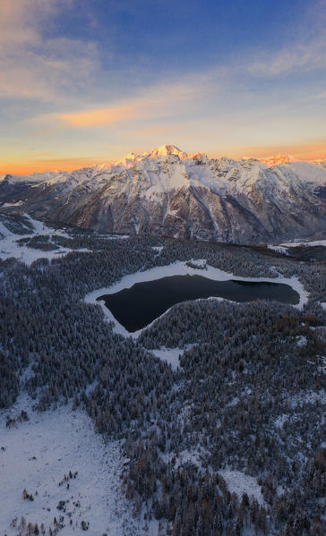 Aerial panoramic of Lake Palù and Monte Disgrazia at dawn, Malenco Valley, Sondrio province, Valtellina, Lombardy, Italy