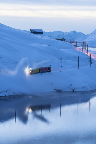 Turbine snowplow in action, Lago Bianco, Bernina Pass, Canton of Graubunden, Engadin, Switzerland