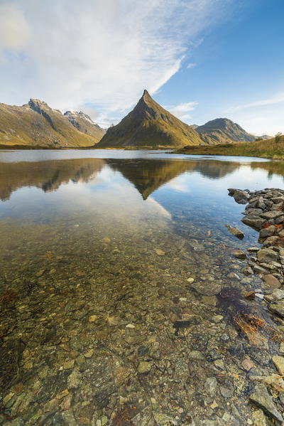Mount Volanstinden mirrored in water, Fredvang, Nordland county, Lofoten Islands, Norway