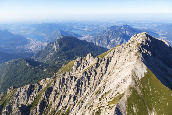Aerial view of Grignetta (Southern Grigna) and Lecco in the background, Valsassina, Lake Como, Lecco province, Lombardy, Italy