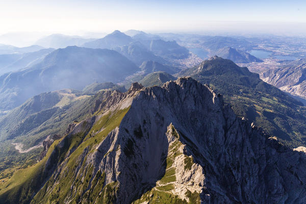 Aerial view of Grignetta (Southern Grigna) and Lecco in the background, Valsassina, Lake Como, Lecco province, Lombardy, Italy