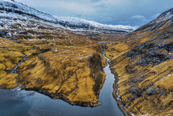 Aerial view of rocky mountains surrounded by sea, Saksun, Streymoy island, Faroe Islands, Denmark