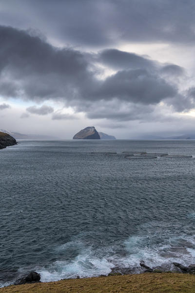 Storm clouds over Koltur island viewed from Sandavagur, Vagar island, Faroe Islands, Denmark