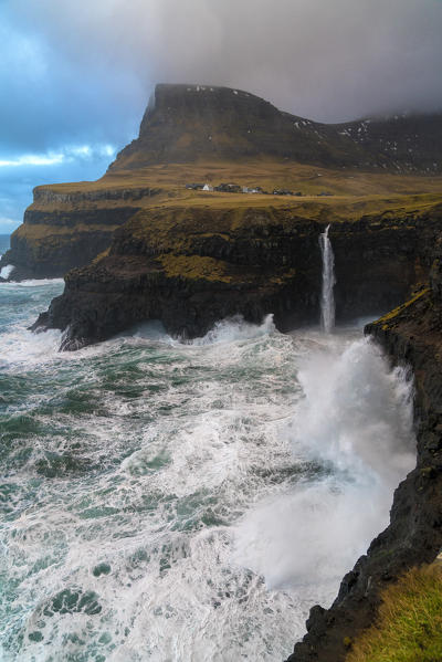 Mulafossur waterfall during a storm, Gasadalur, Vagar island, Faroe Islands, Denmark