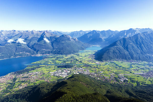 Hang gliding over Colico, Trivio Di Fuentes and reserve of Pian Di Spagna, Valtellina, Sondrio province, Lombardy, Italy