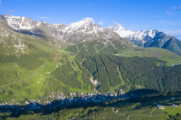 Aerial view of Madesimo with Monte Groppera and Pizzo Stella in background, Valchiavenna, Valtellina, Lombardy, Italy