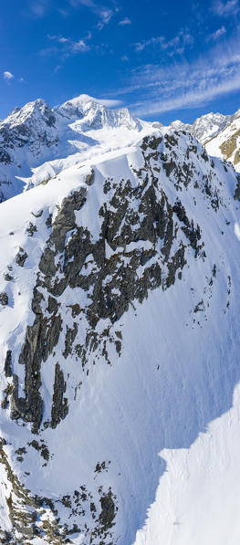 Aerial panoramic of Monte Disgrazia covered with snow, Valle di Chiareggio, Valmalenco, Valtellina, Lombardy, Italy