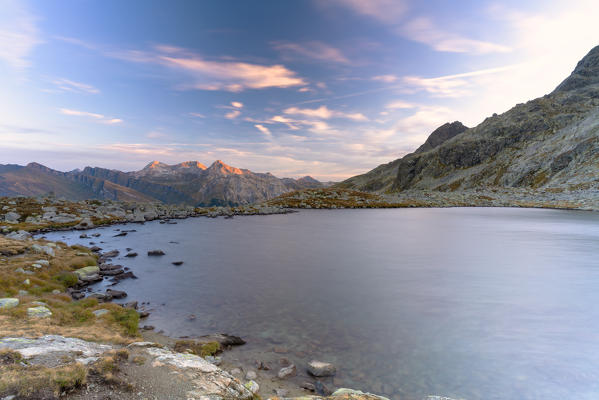 Autumnal sunrise over Laghi Azzurri (Bergsee), Spluga Pass, Valle Spluga, Sondrio province, Valtellina, Lombardy, Italy