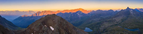 Aerial view of the sky at sunrise over Monte Gaviola and Gavia Pass, Valfurva, Valtellina, Sondrio province, Lombardy, Italy