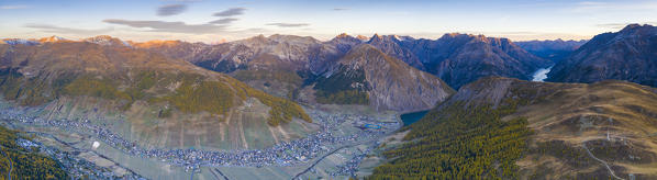 Aerial panoramic of Livigno, Val Federia and lake in autumn, Valtellina, Sondrio province, Lombardy, Italy