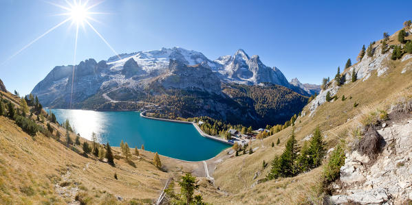 The majestic Marmolada Group and the Lake Fedaia with its turquoise waters, Dolomites, Veneto Italy Europe