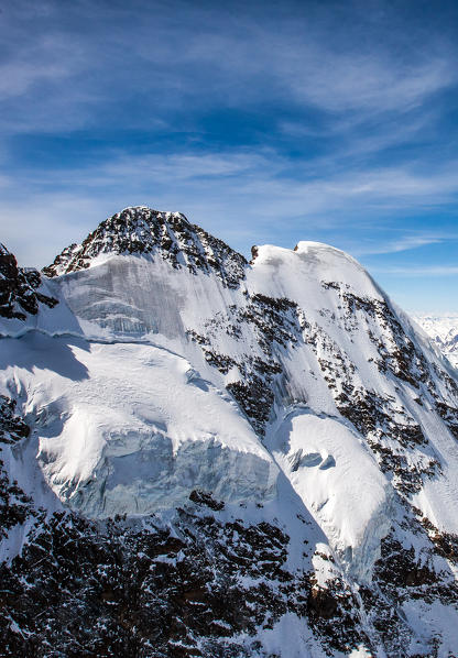 Aerial shot of the north wall of Piz Roseg and its glacier in Engadine, Switzerland Europe