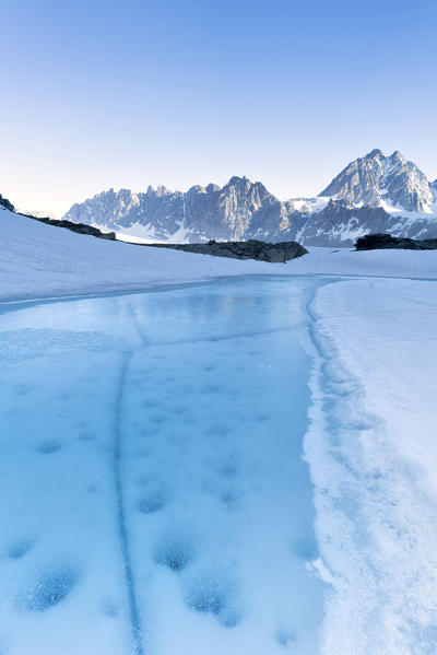 Melting ice on Forbici Lake during thaw, Valmalenco, Valtellina, Sondrio province, Lombardy, Italy