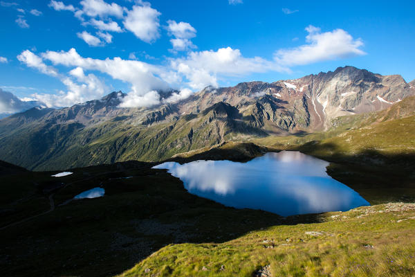 Contrast of lights and shadows at Lake Nero in the Messi Valley Valcamonica, Lombardy Italy Europe