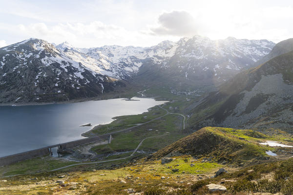 Elevated view of Montespluga lake and dam, Madesimo, Valchiavenna, Valle Spluga, Valtellina, Sondrio province, Lombardy, Italy