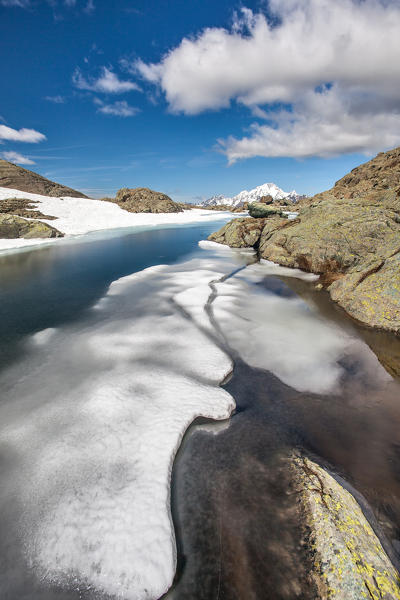 Ice drawings during the thaw at Lake Campagneda Valmalenco,Valtellina Lombardy Italy Europe