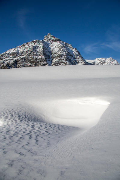 Sasso Moro covered with thick snow after a heavy snowfall in Valmalenco, Valtellina, Lombardy Italy Europe