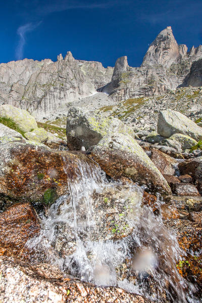 A creek flowing from Pizzo Torrone that intersects Sentiero Roma. Valmasino, Valtellina Lombardy, Italy Europe