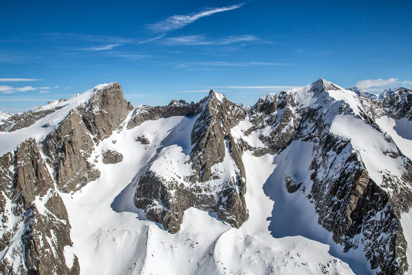 Aerial view of the peaks of Val di Zocca in winter, including Cima di Castello, Punta Rasica and Pizzo Torrone. Valmasino, Valtellina Lombardy, Italy Europe 