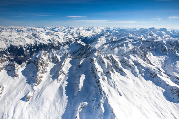 Aerial view of Pizzo Cengalo with the peaks of Val Qualido, Valmasino.Valtellina Lombardy Italy Europe