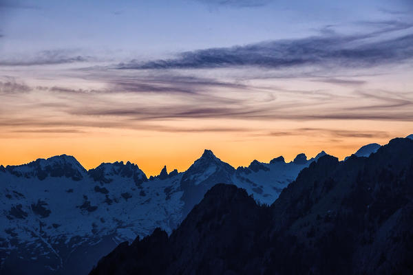 Sunset on the peaks of Valmasino covered in snow.Valtellina Lombardy Italy Europe