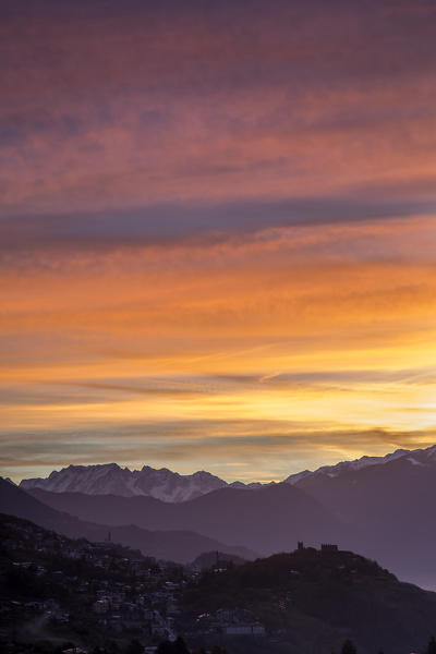 Dawn at Grumello Castle and Adamello seen from Hamlet Mossini Sondrio Valtellina,Lombardy, Italy Europe