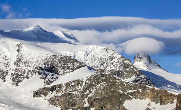 Clouds over Belleviste and Cresta Aguzza.
Diavolezza refuge,Engadine,Canton of Graubunden, Switzerland Europe