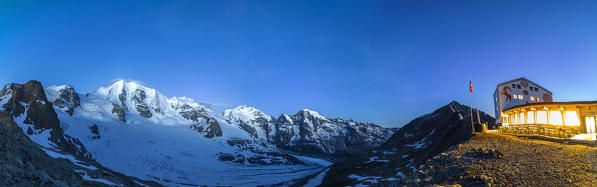 Wide-angle shot of Vedret Pers and Pizzo Bernina, Palù and Bellaviste during the dusk at Diavolezza refuge.
Engadine, Canton of Graubunden, Switzerland Europe