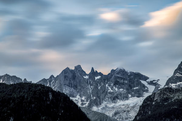 Clouds running fast over the granitic peaks of Sciore while dawn is coming. Soglio Val Bregaglia Canton of Graubunden Switzerland
Europe