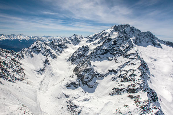 Aerial view of the pyramid of Mount Disgrazia in winter with the glacier of Ventina in close-up. Valmalenco, Valtellina,
Lombardy, Italy Europe
