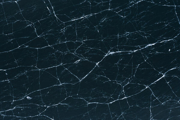 Cracked ice on frozen surface of Lake Silvaplana view from above, Maloja, Engadine, Graubunden canton, Switzerland