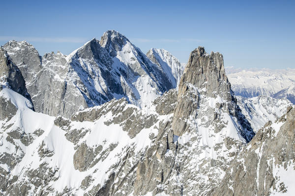 Aerial view of Ago di Sciora with Pizzo Cengalo in winter. Val bondasca, Val Bregaglia, Canton of Grisons Switzerland Europe